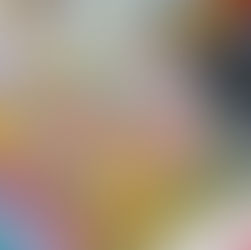 Watercolor sketchbook spread filled with vibrant wildflowers in pink, yellow, red, and purple, layered with delicate green foliage. The page sits beside a palette of paints and color swatches, showing the creative process from testing hues to final composition. Loose pencil sketches peek out underneath, capturing an in-progress botanical illustration with a soft, natural, and expressive style.