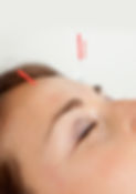 Macro detail of three needles in face of