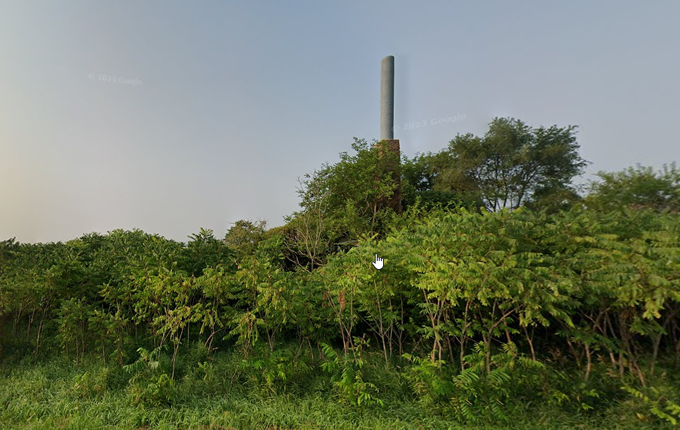 The chimney and some ruins is all that is left of the still on the corner of 650 W 1050 N