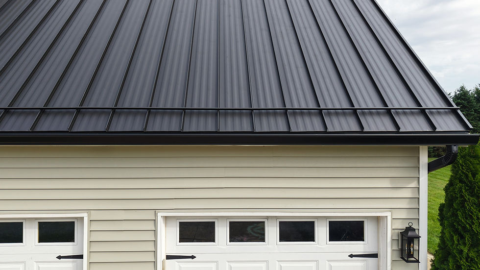 Frost Black standing seam metal roofing installed on a steep Churubusco, Indiana home
