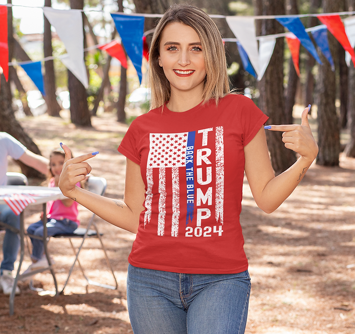 Woman wearing a red t-shirt with Trump 2024 and a blue line flag design.