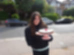 Andrea holding a cake