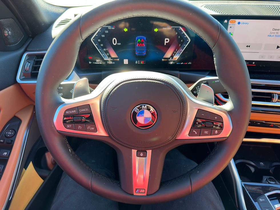 2023 BMW 330i steering wheel and gauge cluster