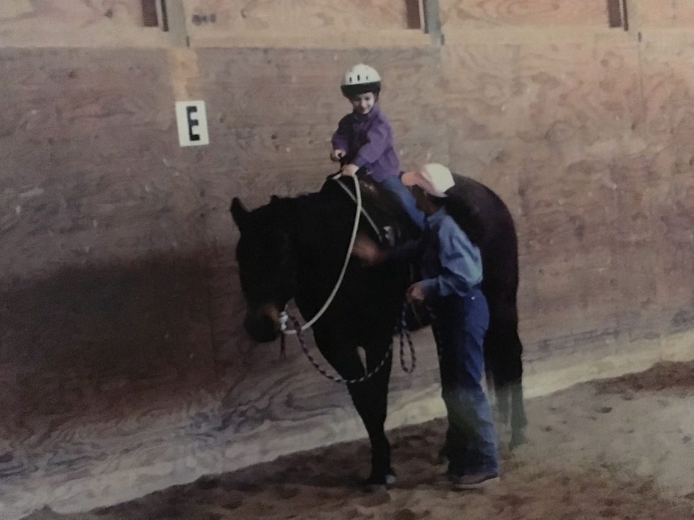 Tori Goldsworthy EPS (age 4) during riding lessons in South Eastern Wisconsin in a lesson barn with a simple indoor arena set up.