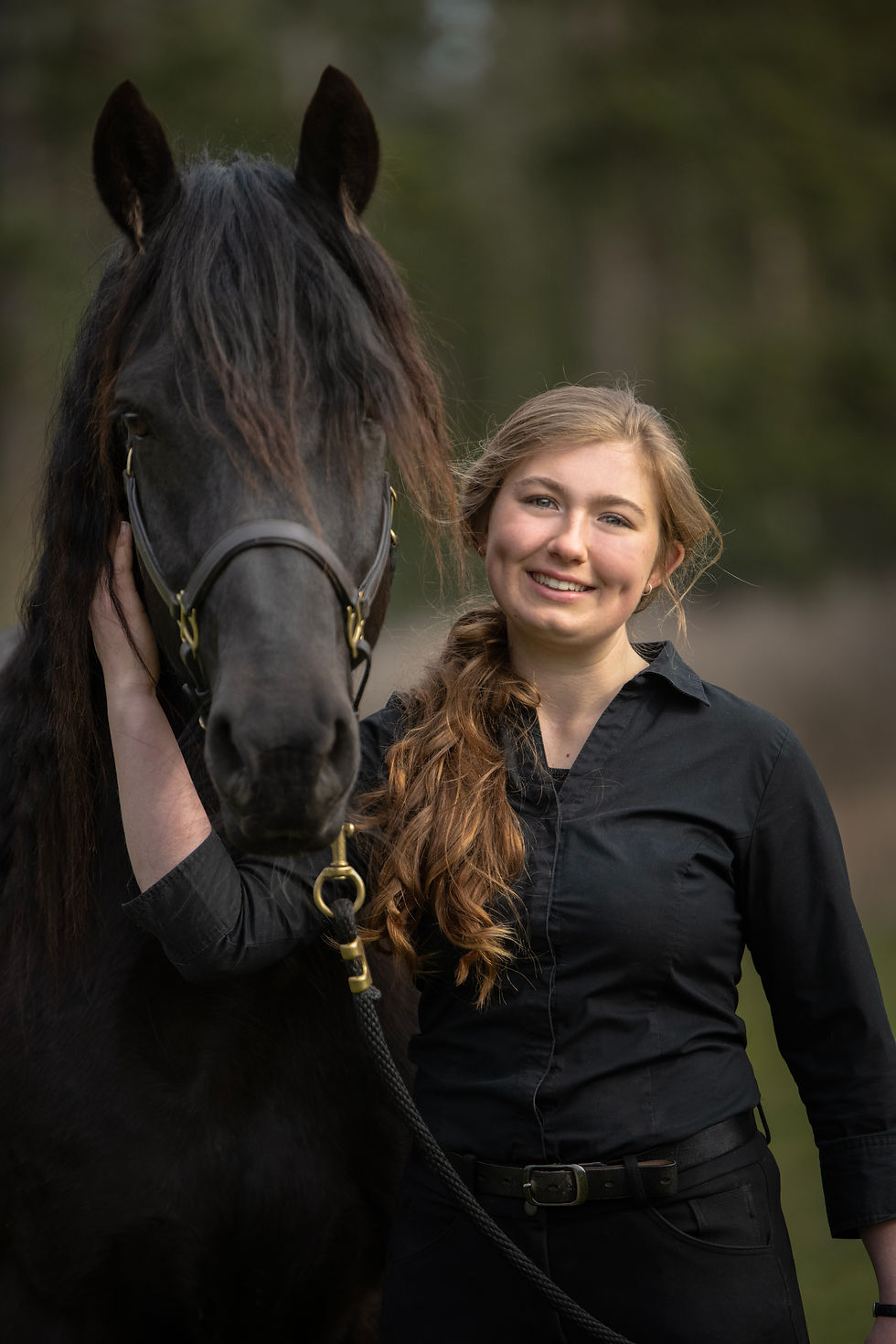 Marissa and Talenti. Talenti is a 9-year old black gelding from the South Steens HMA.