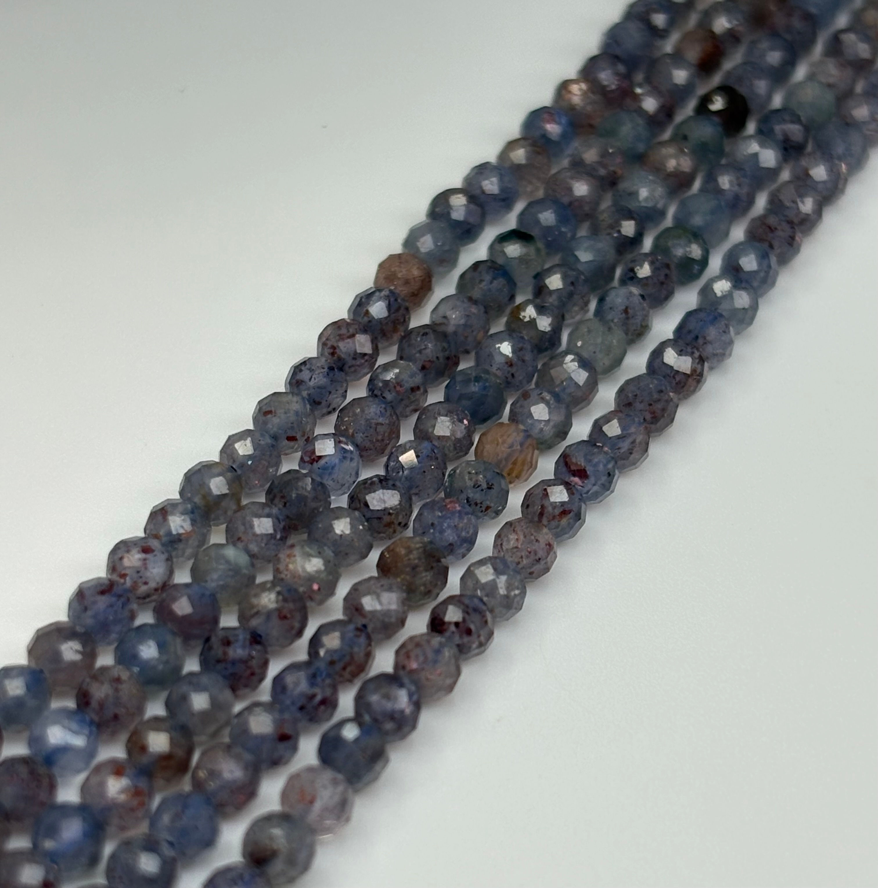 Blood Iolite Strand 3mm faceted: 1 Strand
