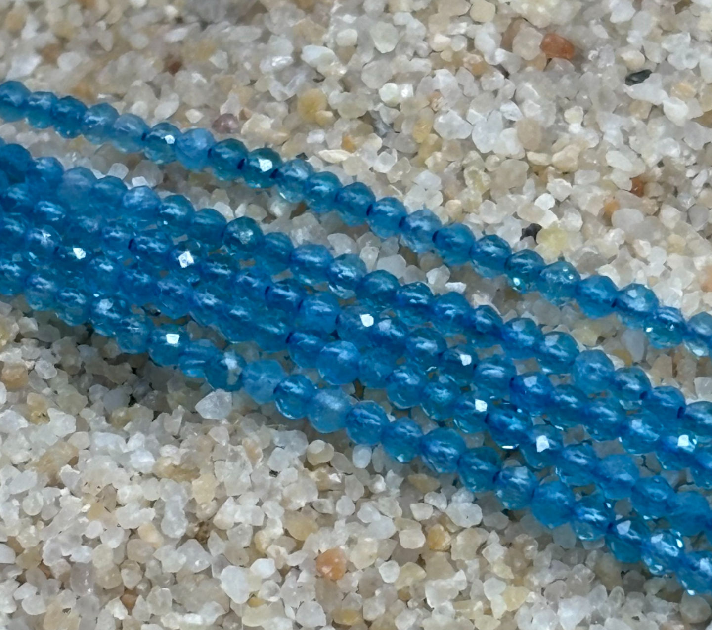 Neon Apatite 2mm Faceted Strand