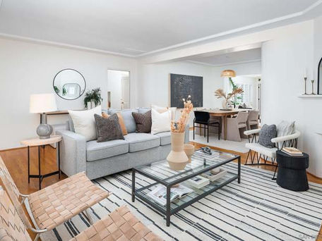 Remodeled interior living room with wood flooring and spacious room with bright and warm feeling.