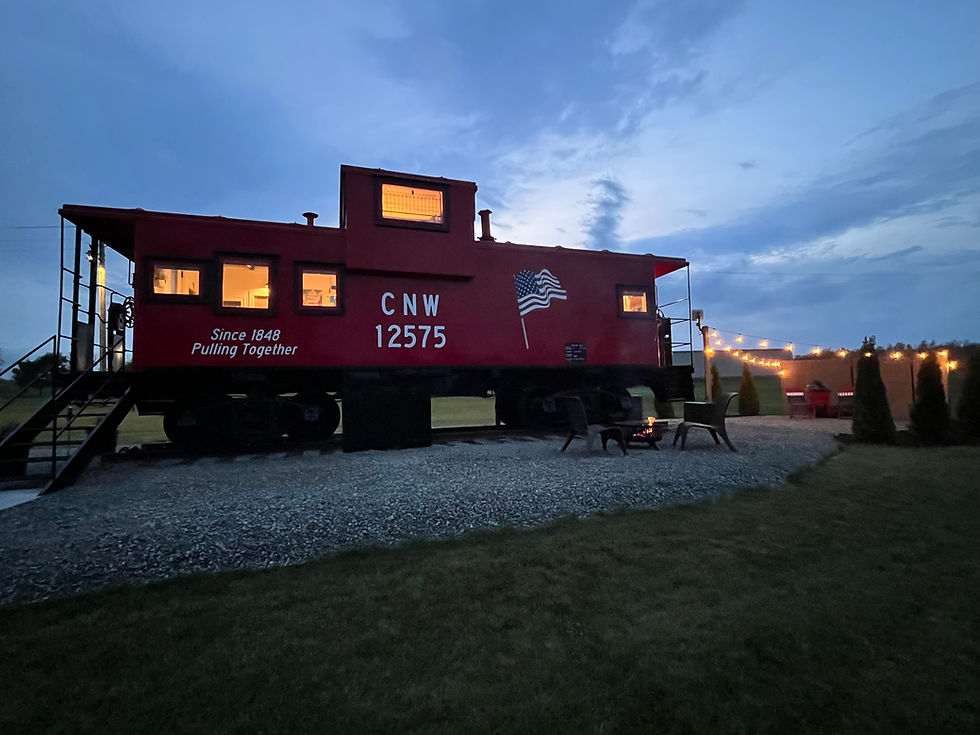 horizontal firepit and caboose distant