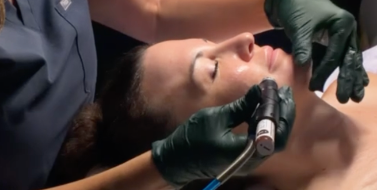 Client receiving a HydraFacial at Flirt Beauty Bar in Temecula.
