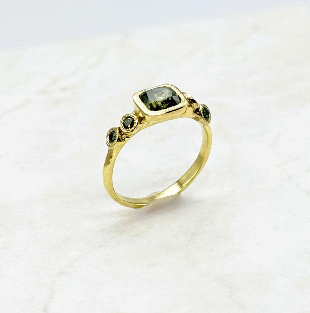 Green diamonds ring