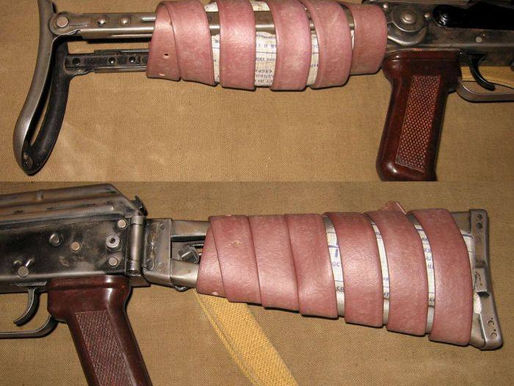 Pink rubber band on the AK stock - what is it?