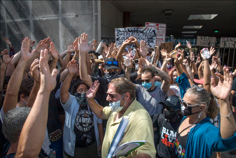 Tenants in New Orleans block entry to a courthouse