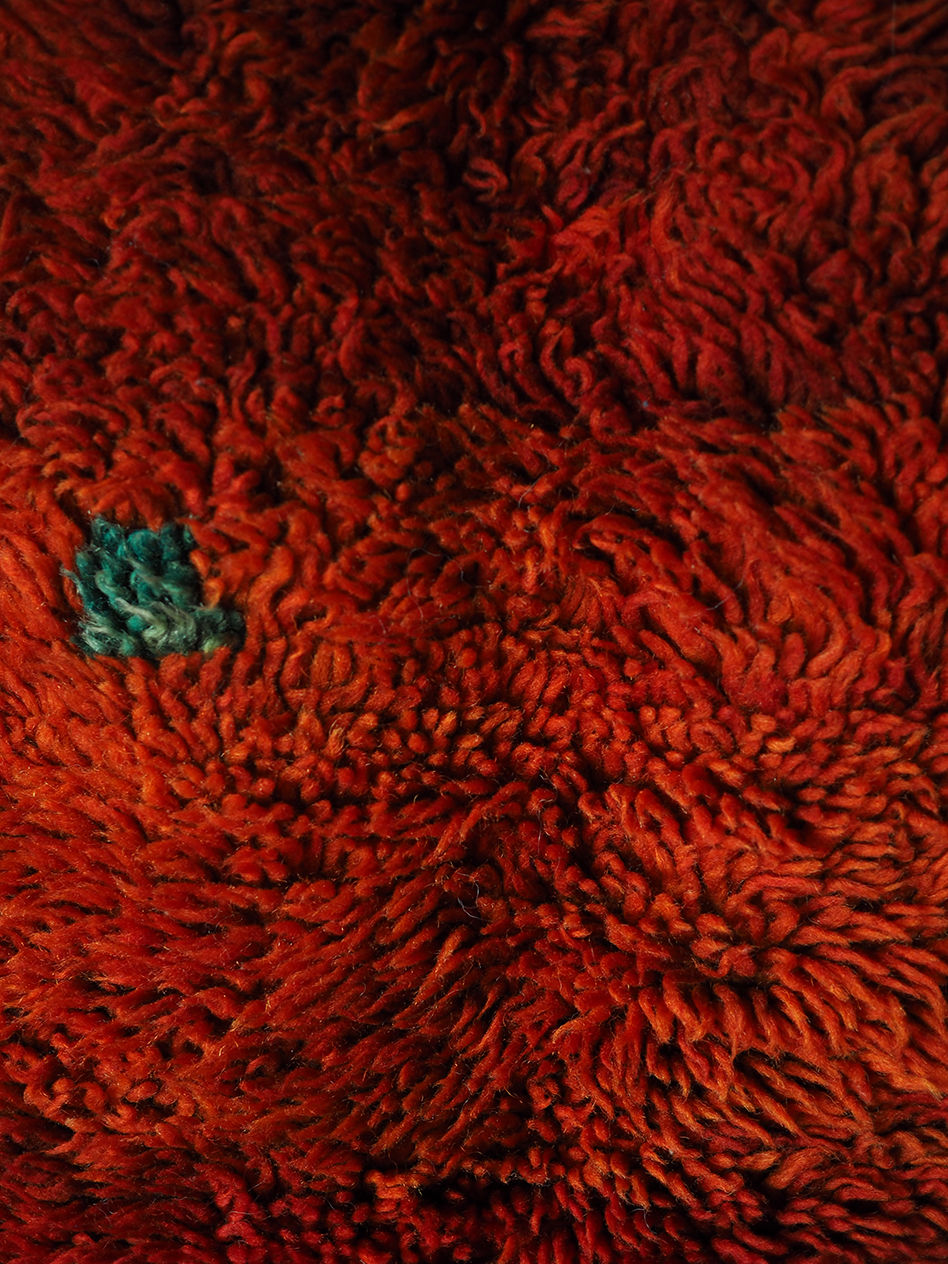 Thumbnail: mid century berber rug in reds and oranges with deep pile