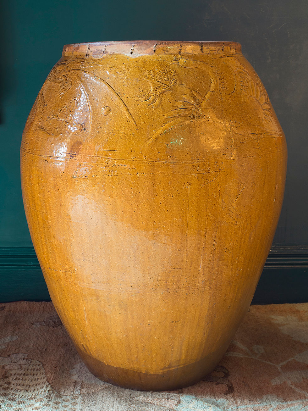 Thumbnail: very large mustard yellow floor vase with embossed decoration of dragon and phoenix across the top
