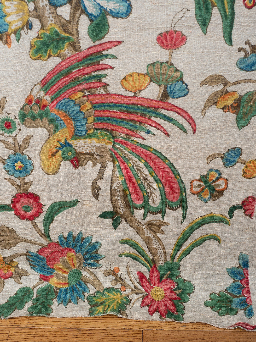 Thumbnail: chinoiserie textile with vibrantly coloured exotic birds and flowers in pinks, greens and yellows on a plain linen ground