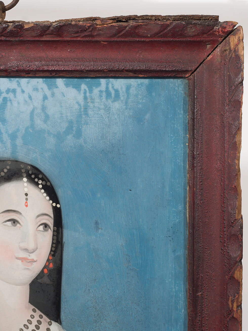 Thumbnail: Portrait of a pale skinned woman on a textured blue background. Pearls in her long black hair and at her neck, holding a rose