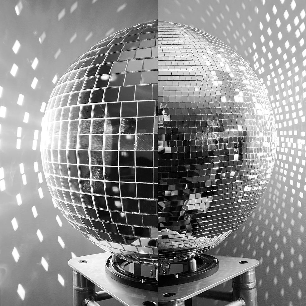 Mirror ball on the left half, glitter ball on the right half (not a real disco ball, but a composite of two images).