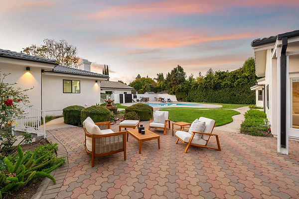 elegant-backyard-patio-with-pool-at-sunset-2025-02-10-07-04-40-utc.jpg