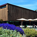 An image of the Formby Pool from outside, showcasing the outdoor Cafe seating area