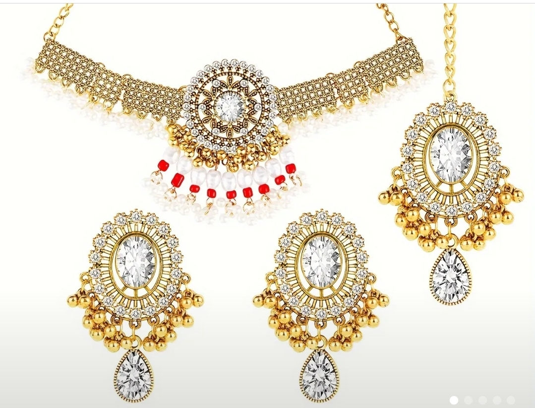 Gold and Diamond Set with a touch Ruby