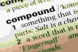 Close-up of the word "compound" in a dictionary entry.