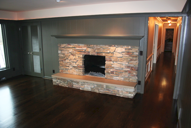 Fireplace with Dark Hardwood Floors