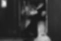 Photo of couple sitting in a photo booth 