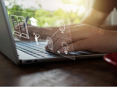 Learner gaining confidence in computing skills using a laptop with online learning and digital education icons.