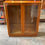 Thumbnail: Wooden Cabinet with Glass Doors & Wooden Shelves
