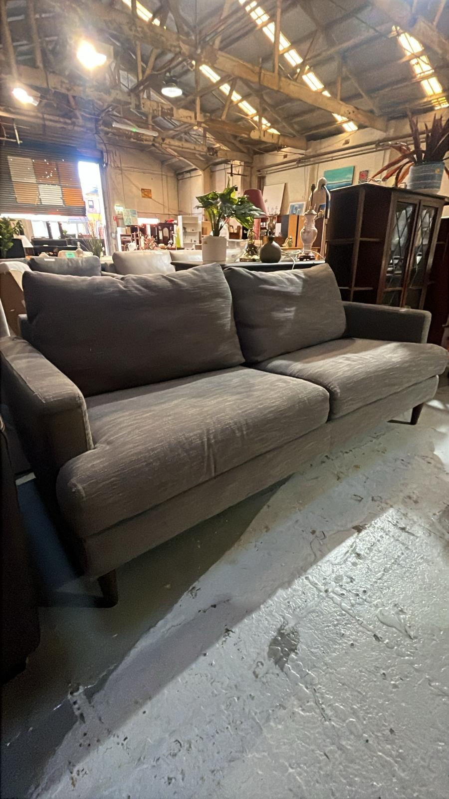 Dark Fabric Two-Seater Sofa with Sleek Wooden Legs