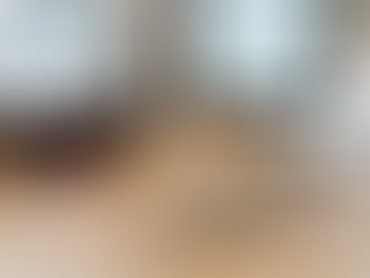 A cover image showing a glass of red wine and a small spirit glass next to a semaglutide injection pen on a wooden table, illustrating the topic of alcohol use while on GLP-1 weight loss medications like Ozempic (semaglutide) and Zepbound/Mounjaro (tirzepatide).