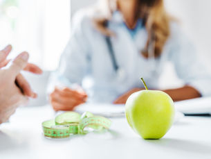 Physician-guided weight loss consultation discussing GLP-1 medications like semaglutide and tirzepatide, with focus on safety, nutrition, and medical supervision.