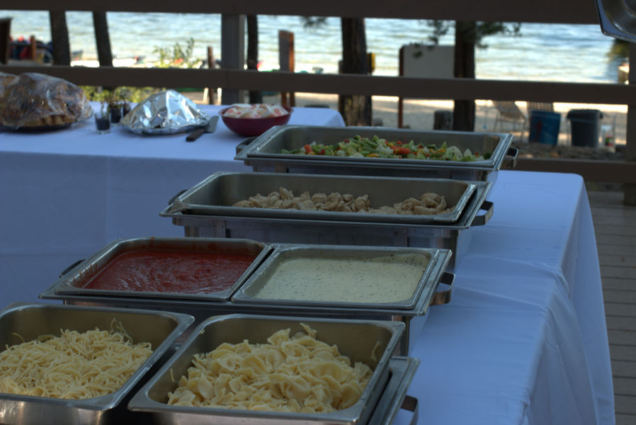 Pasta buffet set on dining hall deck.