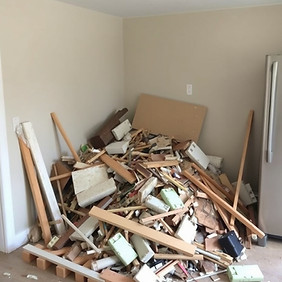 Show me a smaller pile of construction debris from a kitchen remodel.jpg