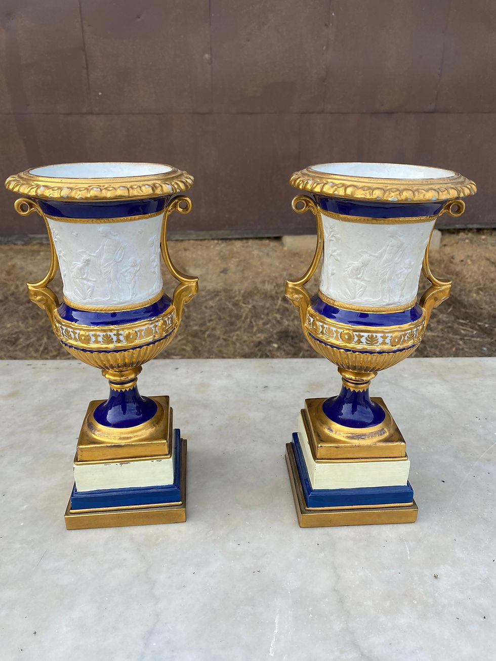 Thumbnail: Pair of 19th Century French Porcelain Urns with Neoclassical Scenes