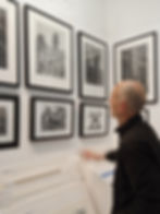 Artist Tim Major with some of his framed etchings at the Greenwich Printmakers gallery