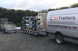 TRAILERS LOADED ON FLATBED.jpg