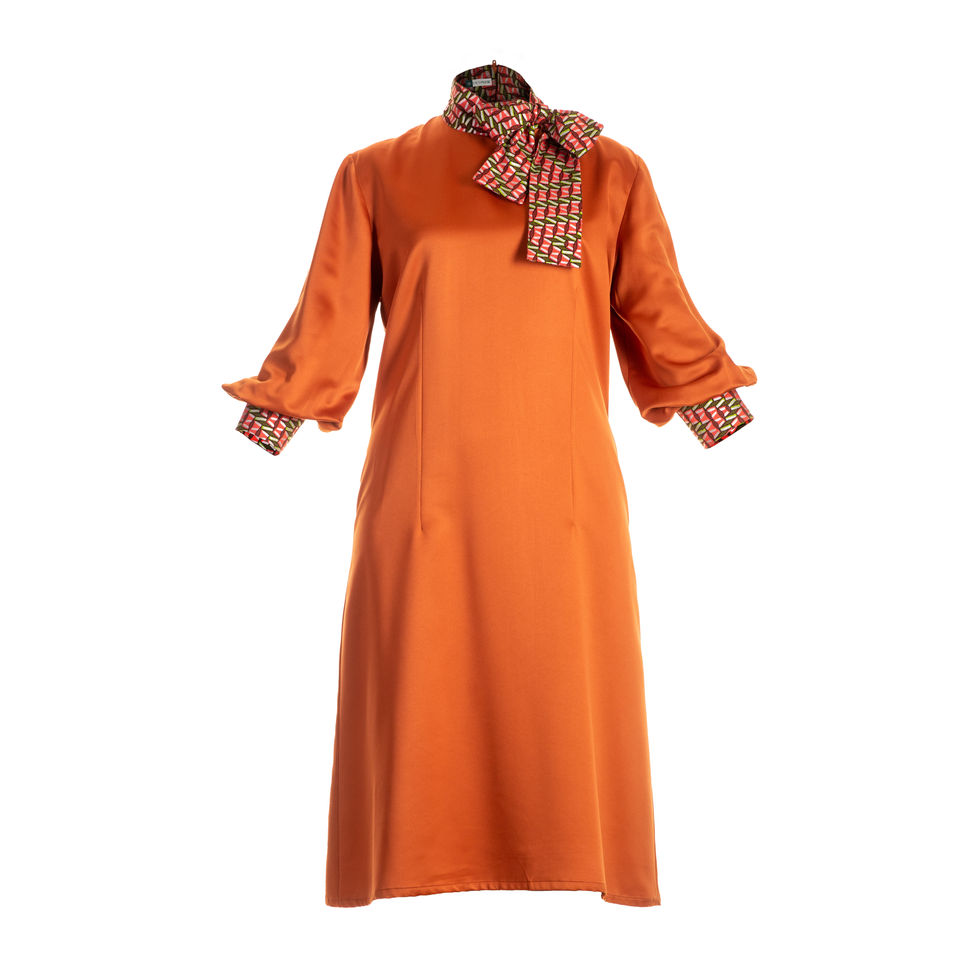 Orange satin long-sleeved dress with wax print detailing