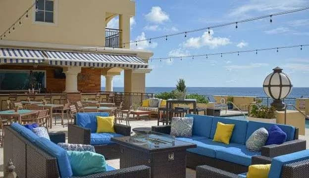 Oceanfront terrace seating at The Atlantic Hotel & Spa on Fort Lauderdale Beach