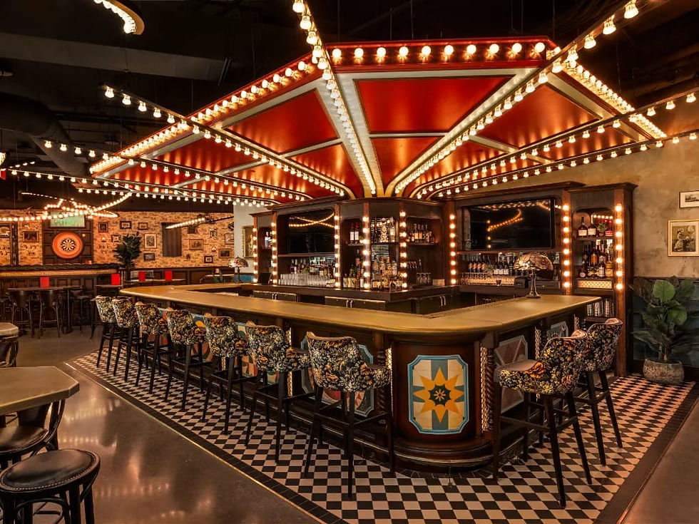 Bar under marquee lights with checkered floors at Flight Club Seattle
