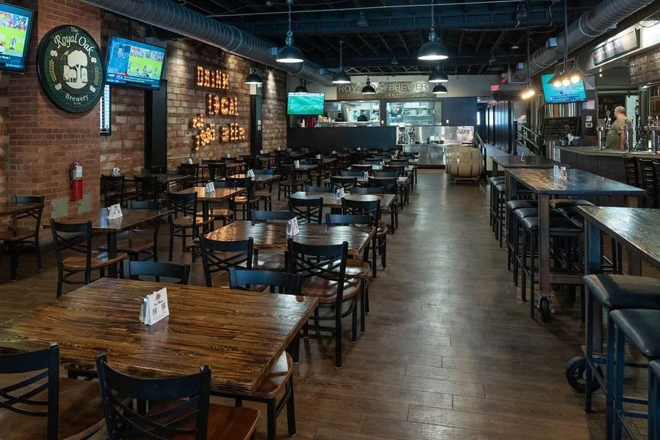 Brewpub dining room with exposed brick at Royal Oak Brewery