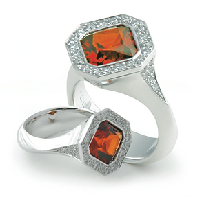 White gold garnet and diamond ring