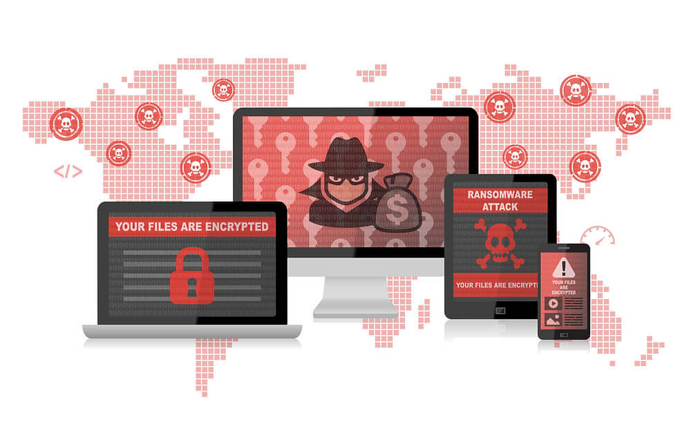 laptop computer tablet smartphone screens with fake example ransomware attack in front of world map
