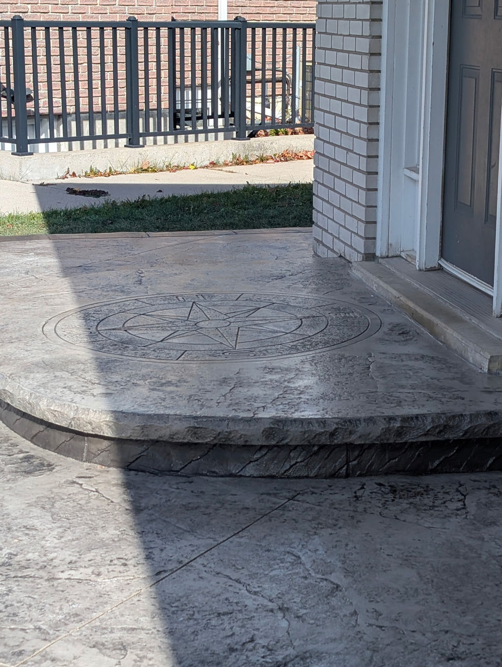 compass stamped front step