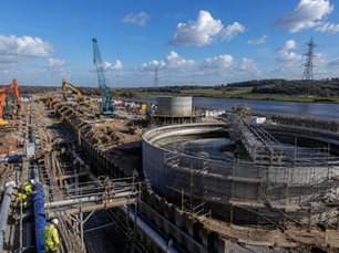 UK infrastructure construction site representing ONS July 2026 confirmed new work infrastructure construction of £37.3 billion in 2025 — water sewerage and electricity sectors growing at 17.8% 74.8% and 15.3% respectively and accounting for 46.5% of all UK infrastructure new work with FRP secondary infrastructure specification decisions governing maintenance liabilities for 30 to 50 years