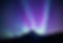 northern lights with purples, blues, greens, and pinks over mountain peak.jpg