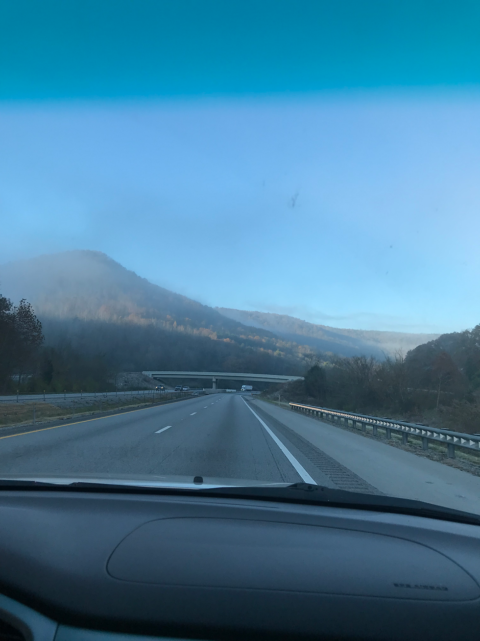 mountain skyline photo taken from a vehicle.