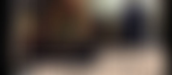An outline of a TV screen over a photo