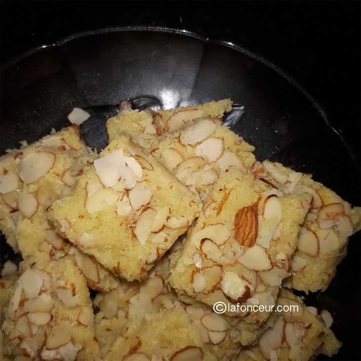 Refrigerate for 2 hours and voila Coconut Burfi is ready to eat. Refrigerate for 2 hours and voila Coconut Burfi is ready to eat.